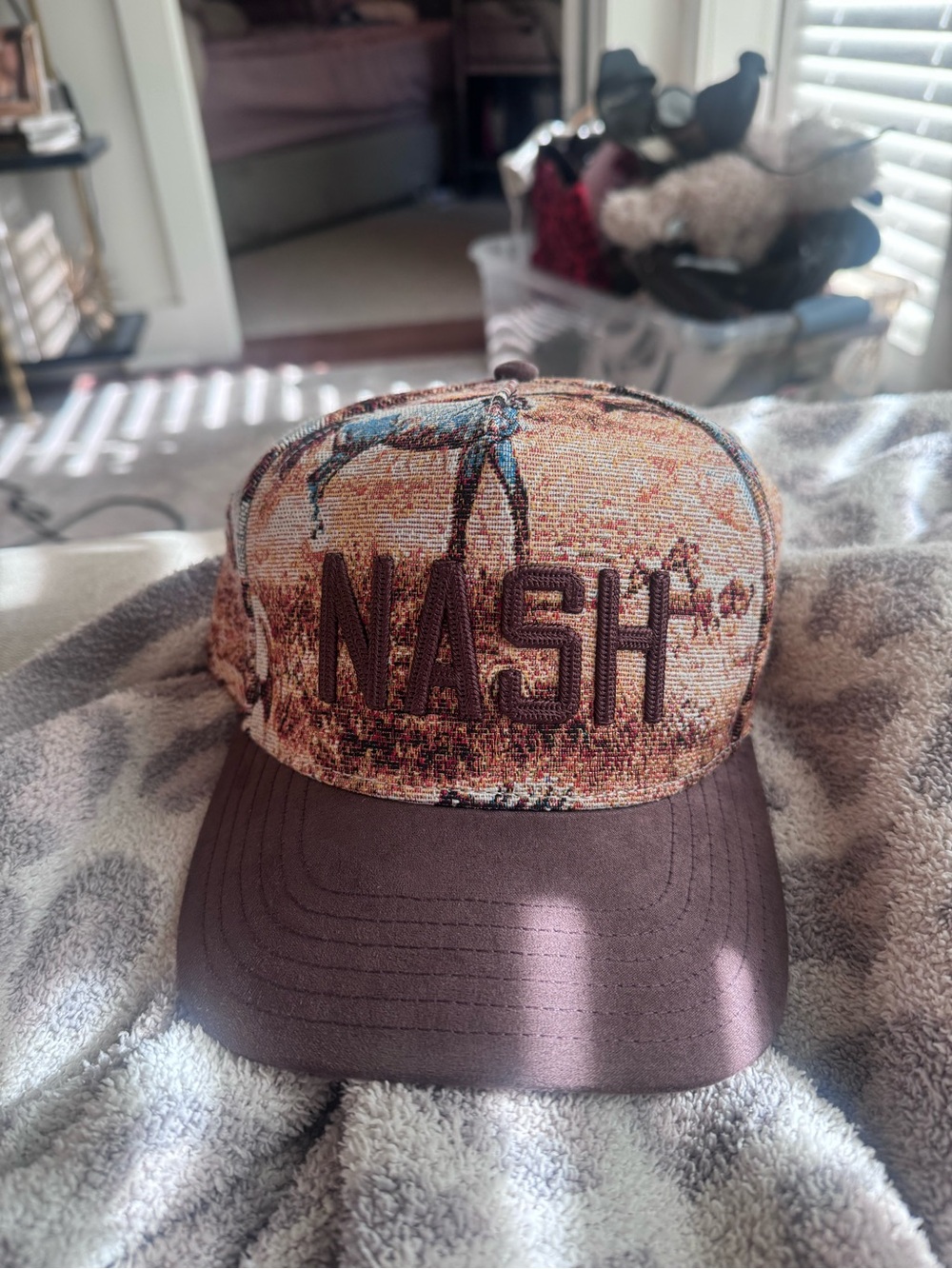 'NASH' Embroidered Trucker Hat in Brown and Tan